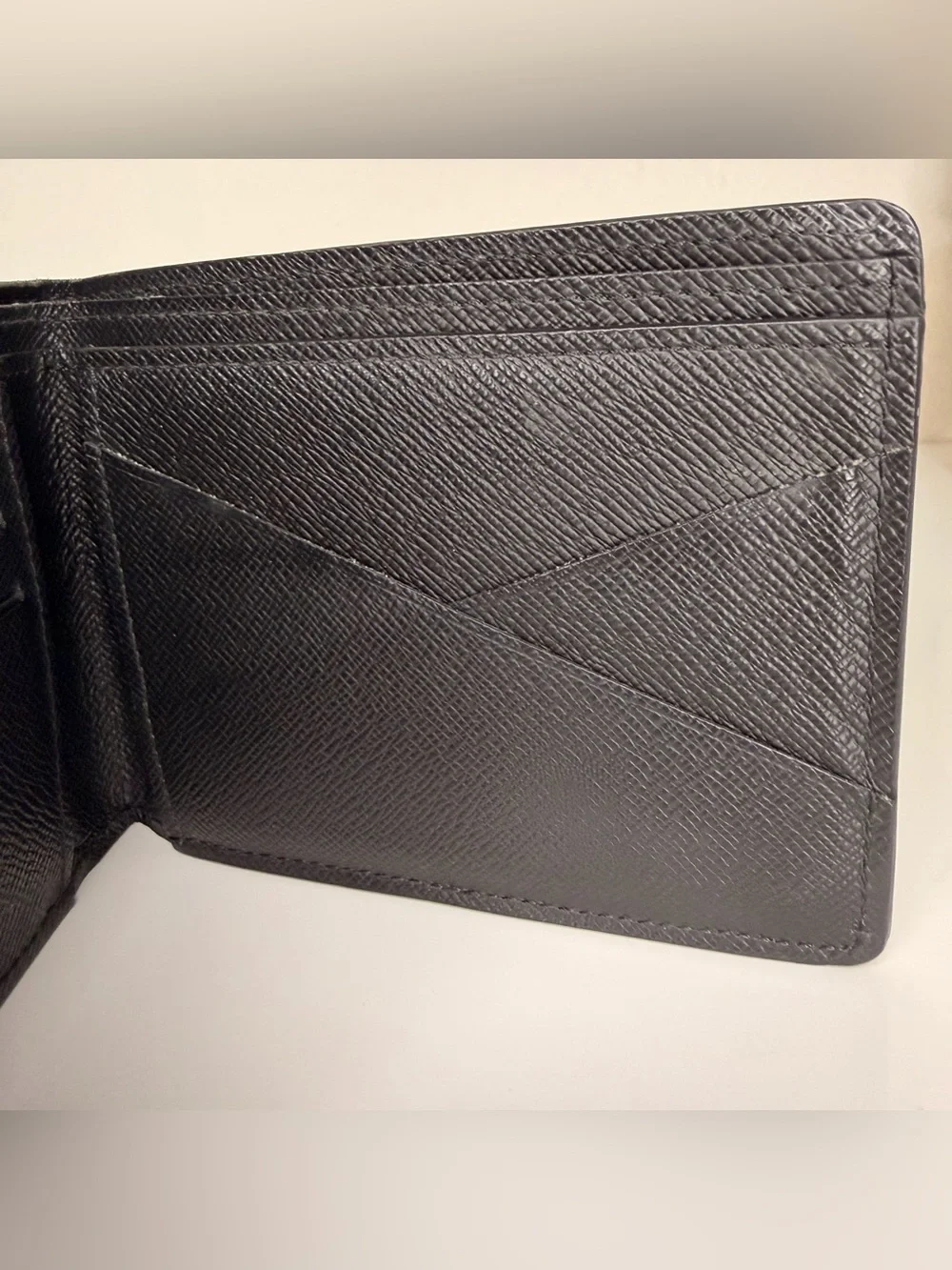 Authentic Louis Vuitton Black Epi Leather Bi-Fold Wallet